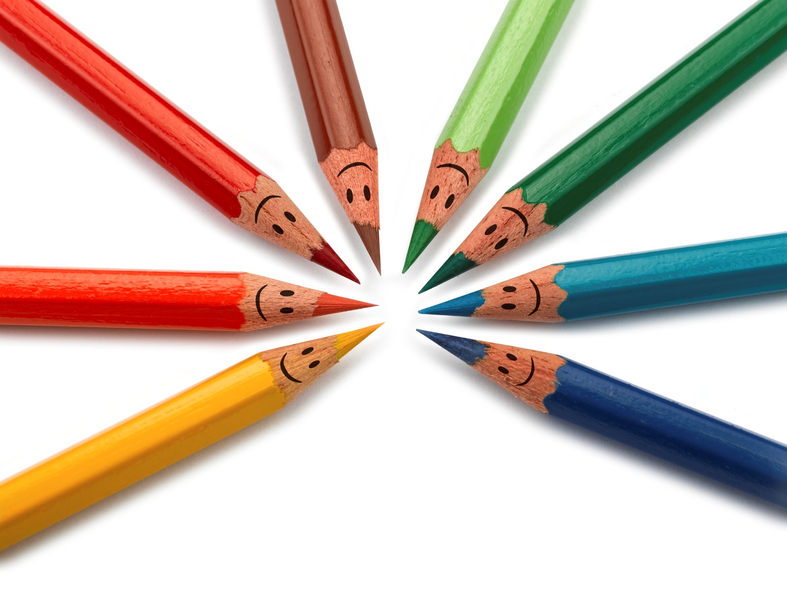 Colourful pencils with smiling faces