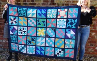 Handcrafted quilt from Castle Quilters