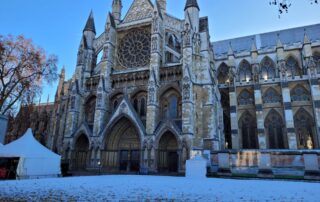 Westminster Abbey at dusk in the snow