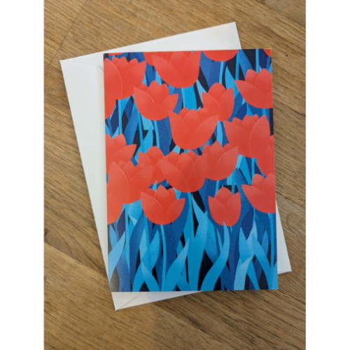 Many red tulips with blue stems